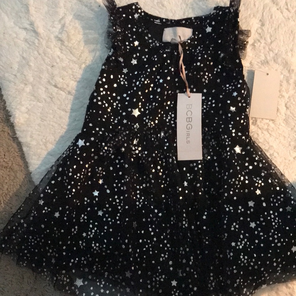 Little girls black dress with silver stars